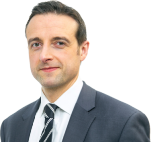 An image of Richard Johnston wearing a suit and tie.