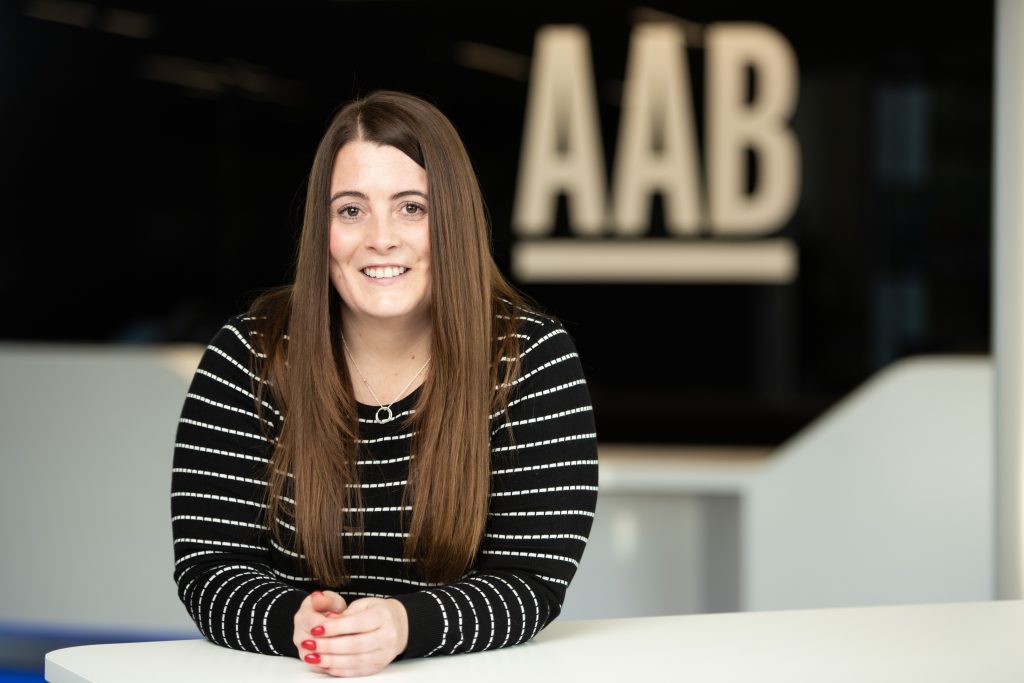 Kelly Shek, Financial Planner at AAB Wealth smiling at camera