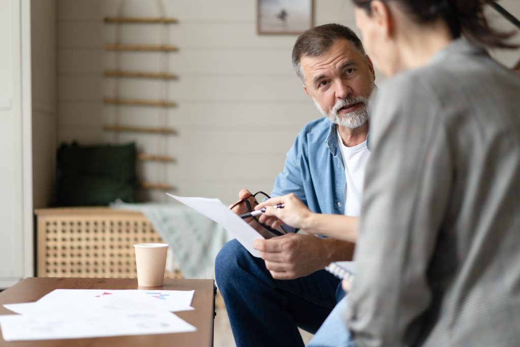 Individual asking a financial planner a question